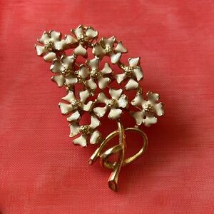 Vintage floral white enamel brooch with center crystals